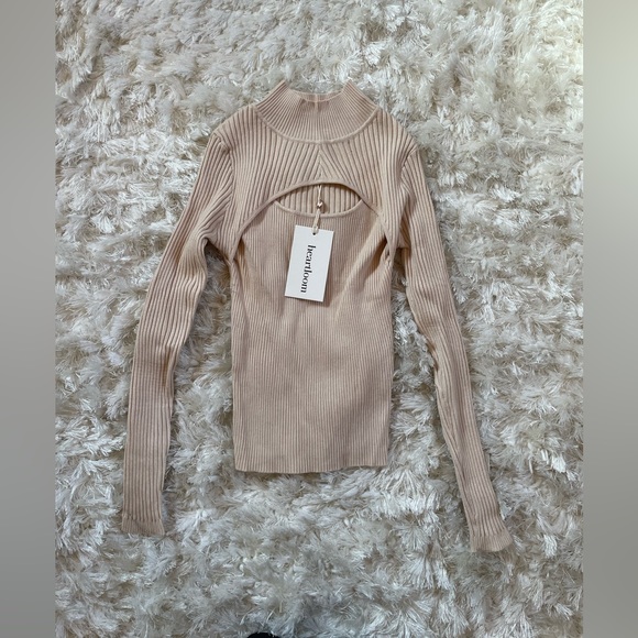 Heartloom Sweaters - NWT Heartloom women’s mock neck sweater with cutout detail at chest.